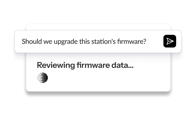 Dialogue box with the question "Should we upgrade this station's firmware?" and a loading indicator stating "Reviewing firmware data..."